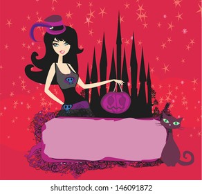 Halloween witch standing with pumpkin 