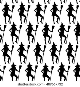 Halloween witches seamless pattern. Black vector silhouettes of beautiful witch standing with broomstick. Background for Halloween design.