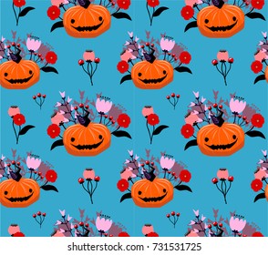 halloween wrapping paper design with pumpkins and flowers.