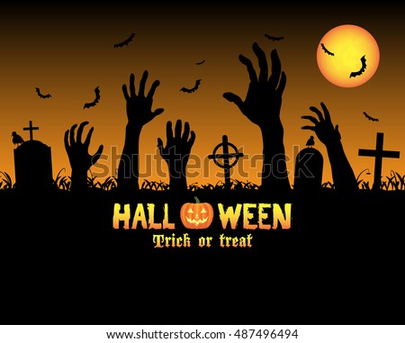 halloween zombies hand in a graveyard