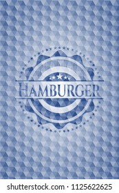 Hamburger blue emblem with geometric background.