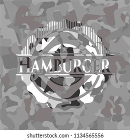 Hamburger on grey camo texture