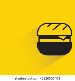 hamburger with shadow on yellow background