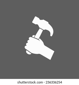 hammer in hand icon