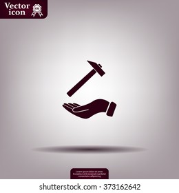 hammer in hand icon
