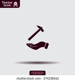 hammer in hand icon