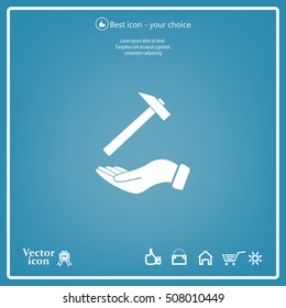 hammer in hand icon