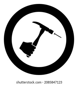 Hammer hits nail in hand claw holding Fixing and repairing working tools icon in circle round black color vector illustration image solid outline style simple
