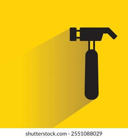 hammer icon with drop shadow on yellow background