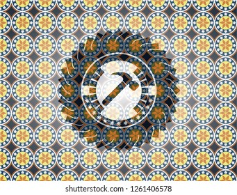 hammer icon inside arabesque badge. arabic decoration.