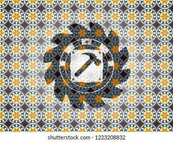 hammer icon inside arabesque emblem background. arabic decoration.