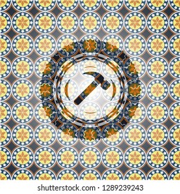 hammer icon inside arabesque emblem. arabic decoration.