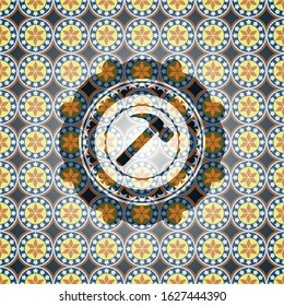 hammer icon inside arabesque style badge. arabic decoration.