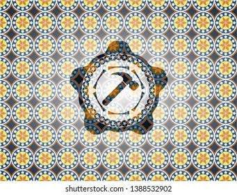 hammer icon inside arabic badge. Arabesque decoration.