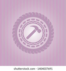 hammer icon inside badge with pink background
