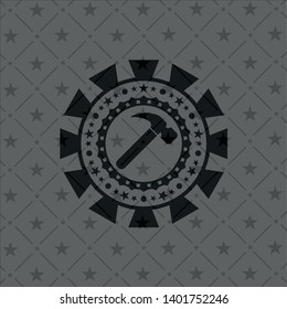 hammer icon inside black badge