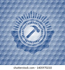 hammer icon inside blue badge with geometric background.