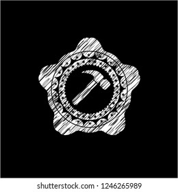 hammer icon inside chalkboard emblem