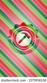 hammer icon inside christmas colors style emblem.