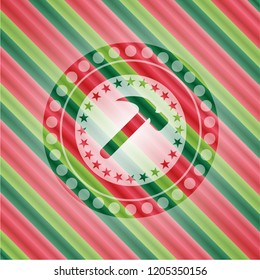 hammer icon inside christmas emblem background.