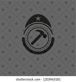 hammer icon inside dark emblem