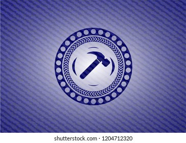 hammer icon inside emblem with jean high quality background