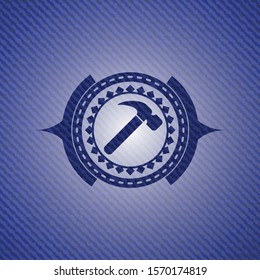 hammer icon inside emblem with jean high quality background