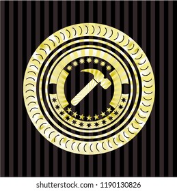 hammer icon inside gold badge or emblem