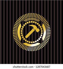 hammer icon inside gold emblem