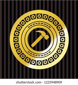 hammer icon inside golden badge or emblem