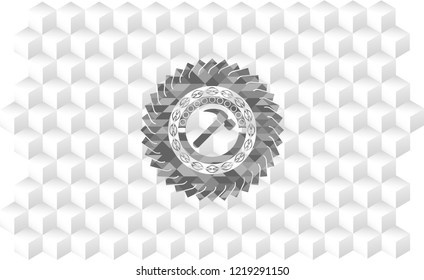 hammer icon inside grey emblem with geometric cube white background