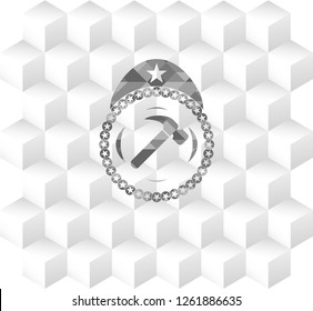 hammer icon inside grey emblem with cube white background