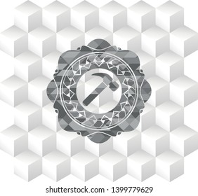hammer icon inside grey emblem with geometric cube white background