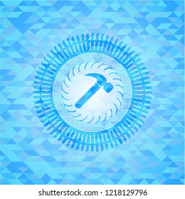 hammer icon inside light blue emblem with triangle mosaic background