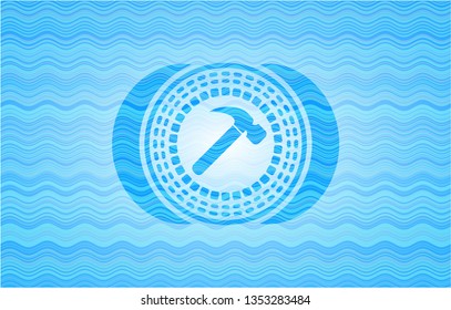 hammer icon inside light blue water badge.