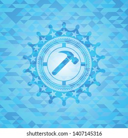 hammer icon inside light blue emblem. Mosaic background