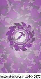 hammer icon inside pink and purple camouflage texture