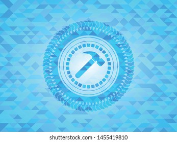 hammer icon inside realistic sky blue emblem. Mosaic background