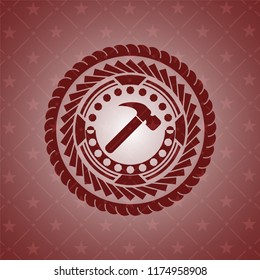 hammer icon inside red icon or emblem