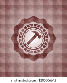 hammer icon inside red geometric pattern emblem. Seamless.