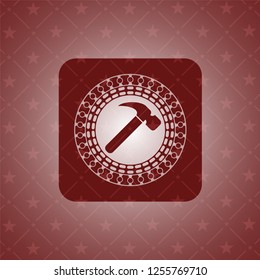 hammer icon inside retro red emblem