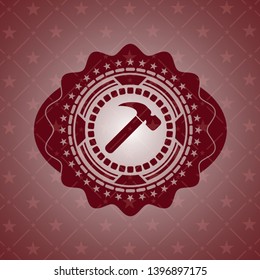 hammer icon inside retro red emblem