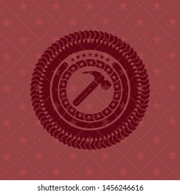 hammer icon inside retro style red emblem
