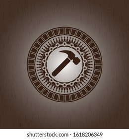hammer icon inside retro style wood emblem