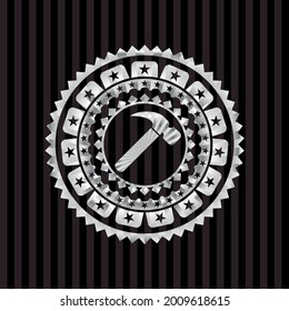 hammer icon inside silver badge. 