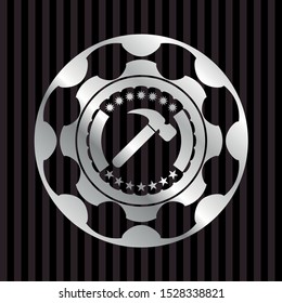 hammer icon inside silvery shiny emblem