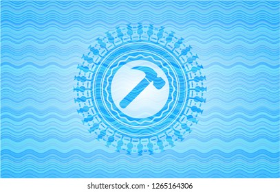 hammer icon inside sky blue water emblem.