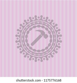 hammer icon inside vintage pink emblem