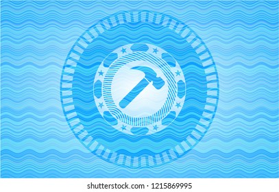 hammer icon inside water wave representation emblem background.