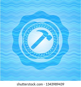 hammer icon inside water wave concept emblem background.
